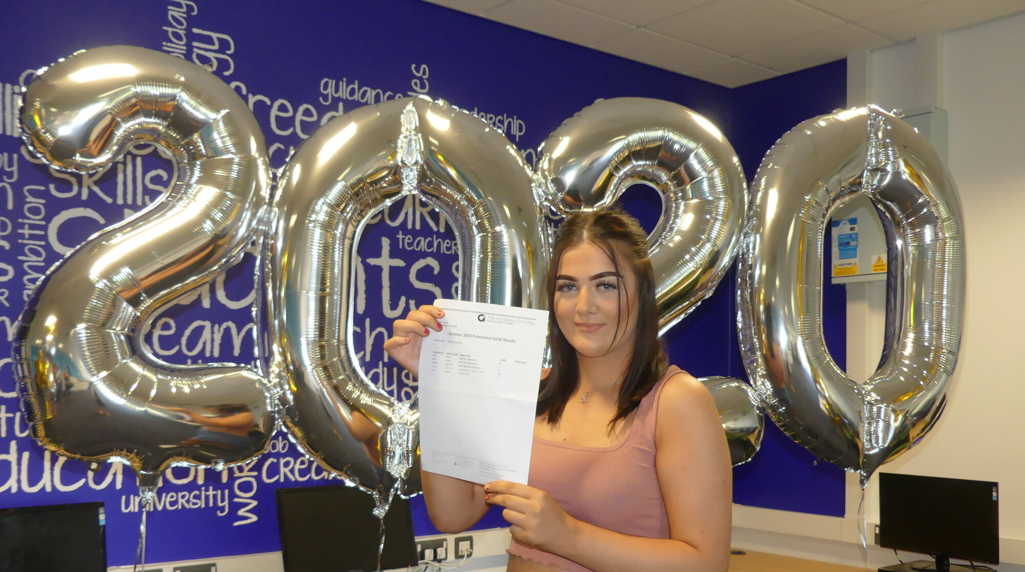 megan receiving her gcse results at the academy grimsby